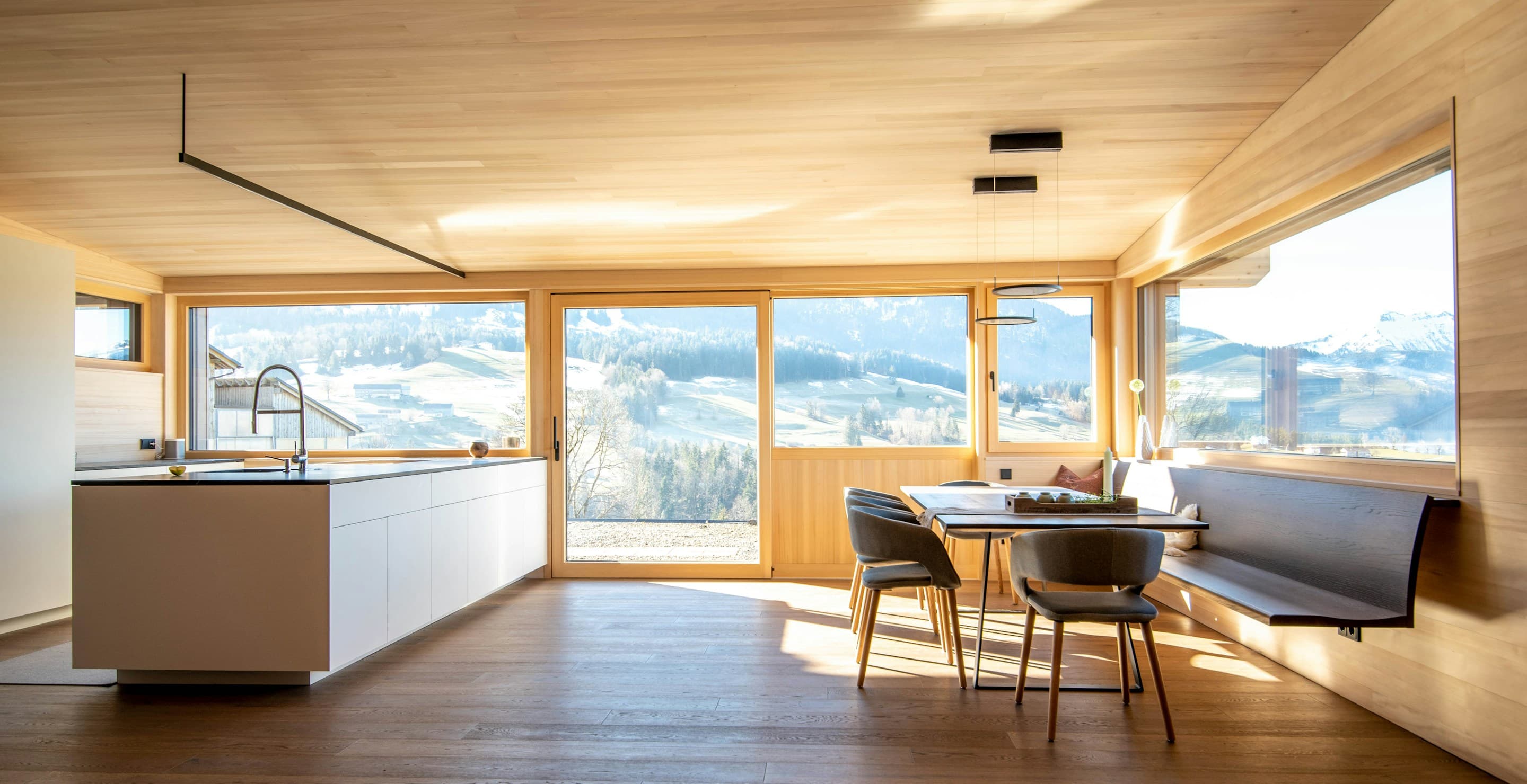 A wood-clad kitchen at the visualization stage — finishes locked, before construction